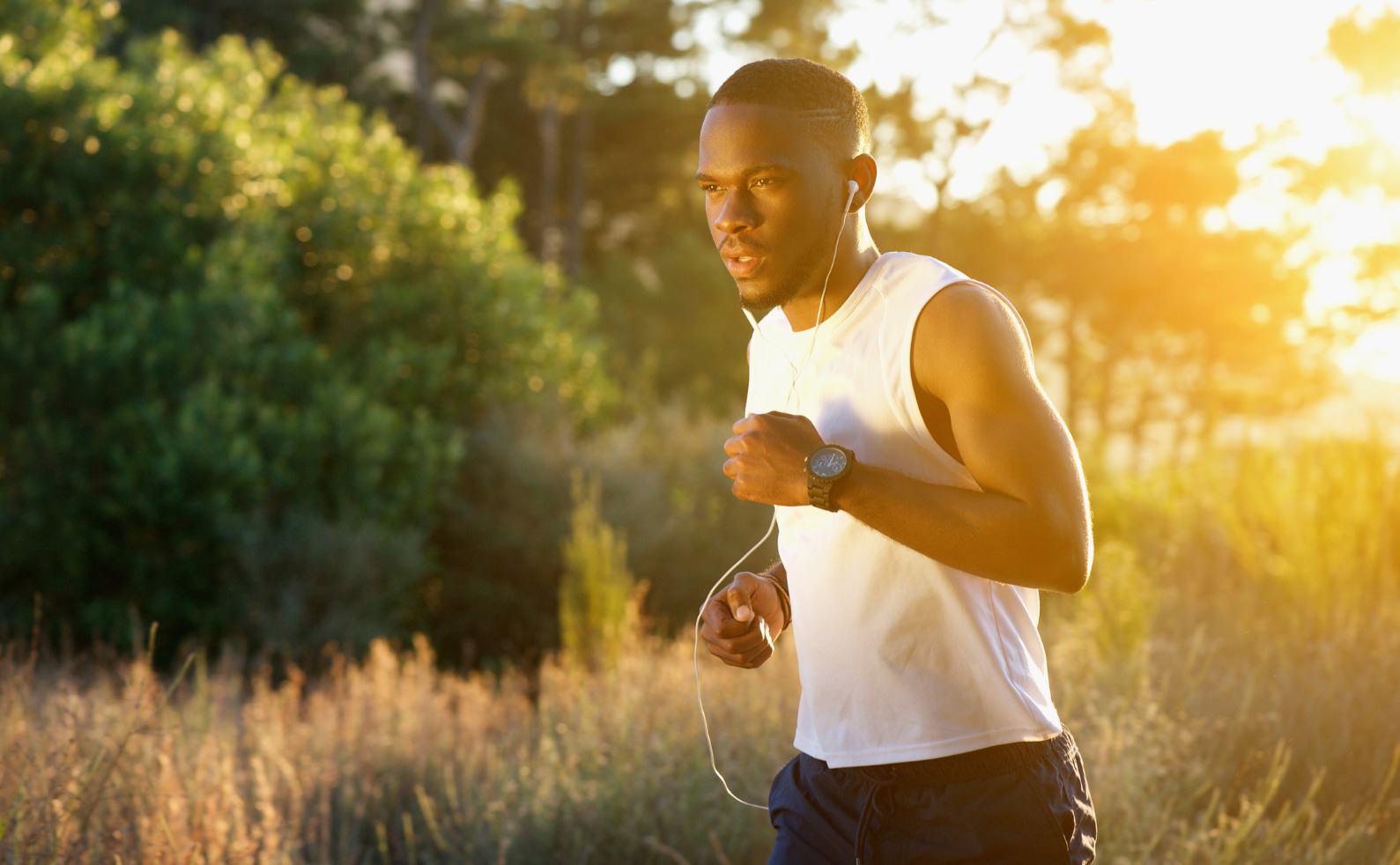 FINALsporty young man running outdoors in nature picture id535938841